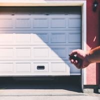 reasons why do garage door jerk when closing