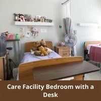 Care Facility Bedroom with a Desk