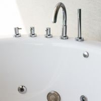 different parts of a bathtub faucet