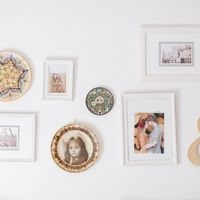 different ways to hang pictures on concrete walls