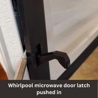 Whirlpool microwave door latch pushed in